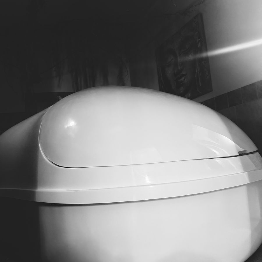 A float pod with the lid raised
